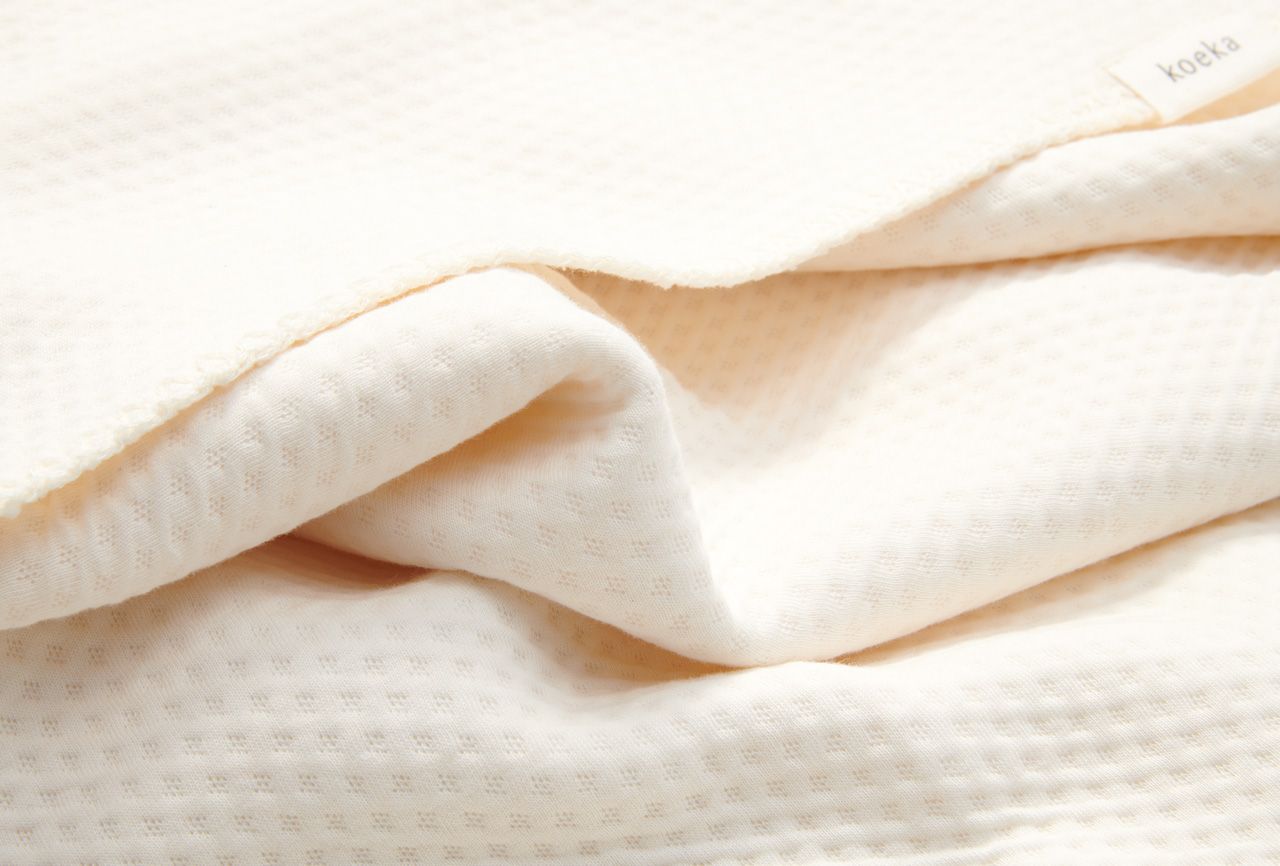 Koeka wiegdeken Warm White