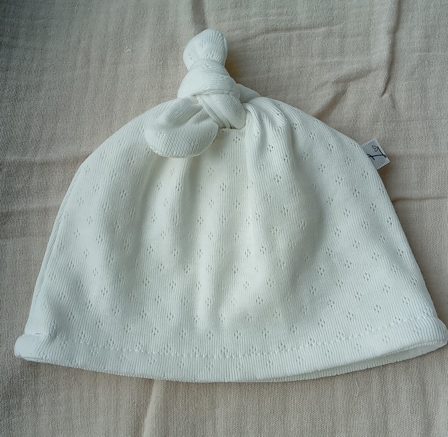 Mutsje wit pointelle 0-3M