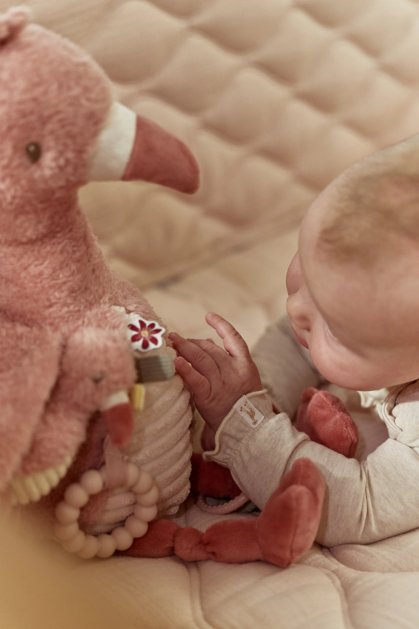 Activiteitenknuffel flamingo